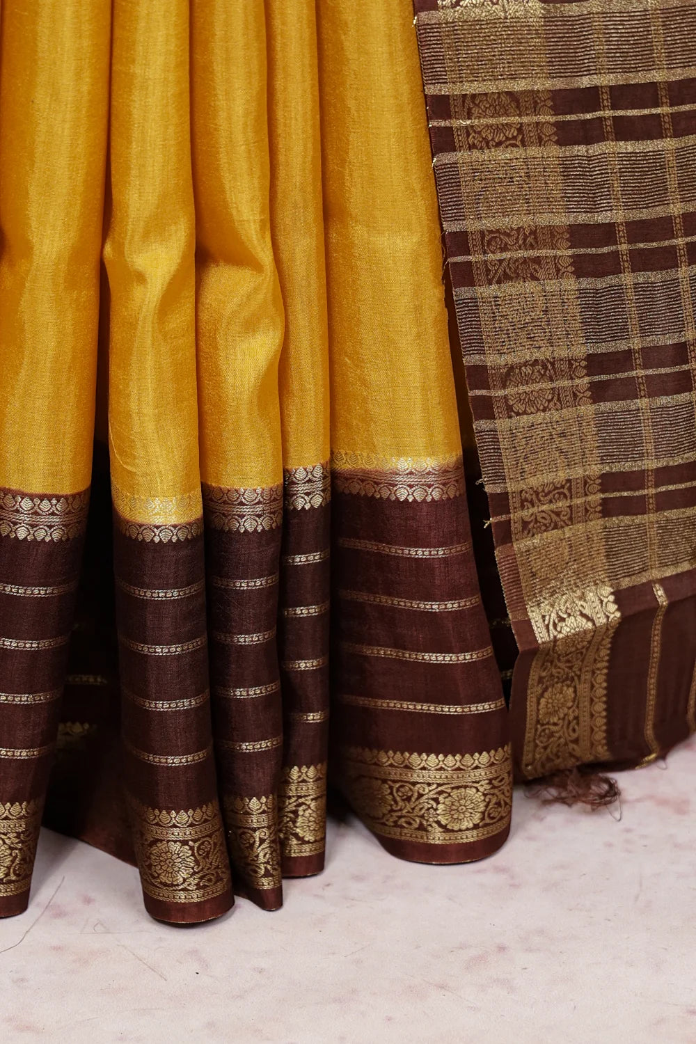 Mango Yellow Binni Silk Saree fabric spread, line border detail