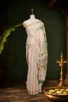 Golden tissue Kerala saree with painted peacock design - Seematti