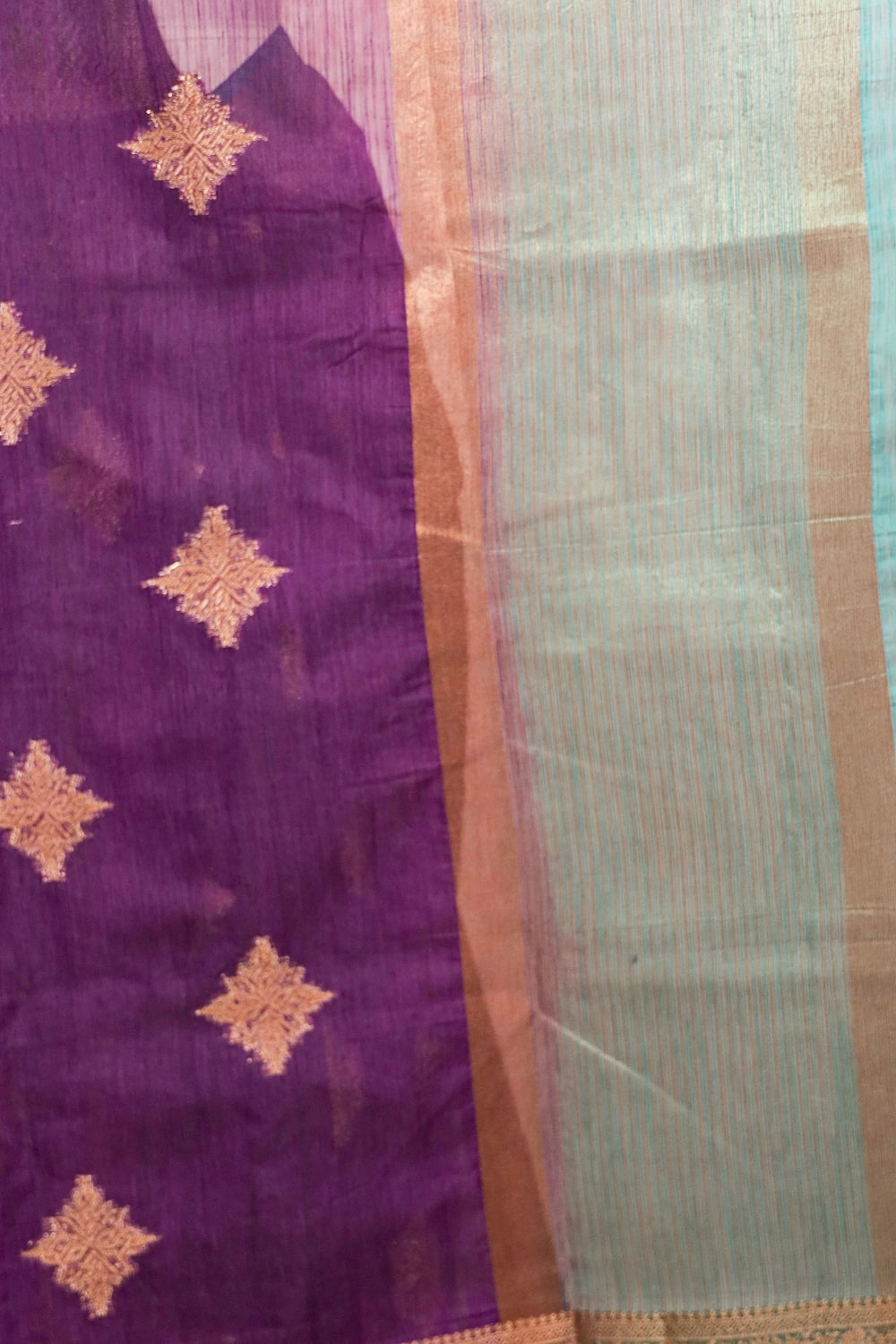 Semi jute saree teal and gold zari paisley border detail