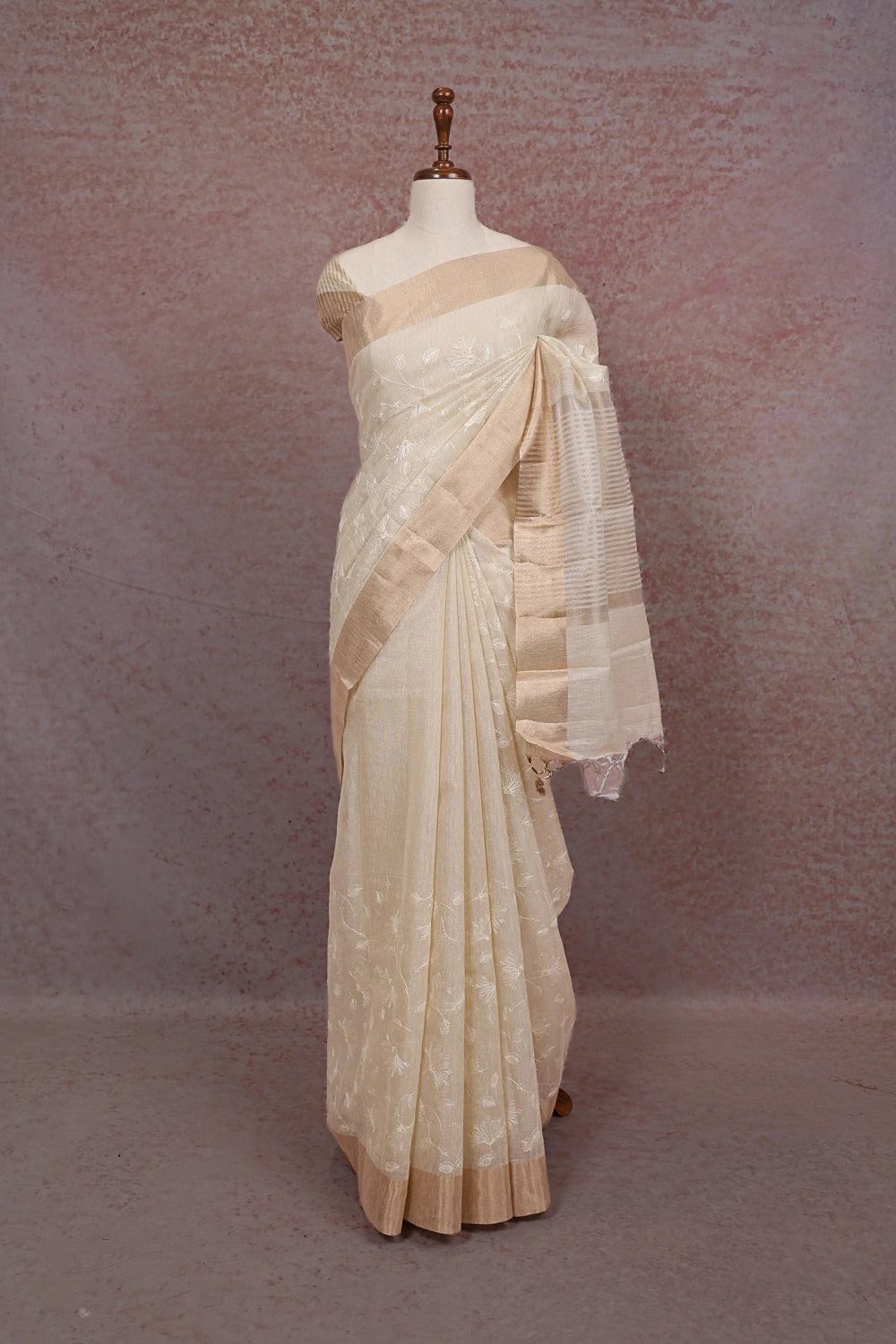 Off white kota saree with copper border, draped on mannequin - Seematti