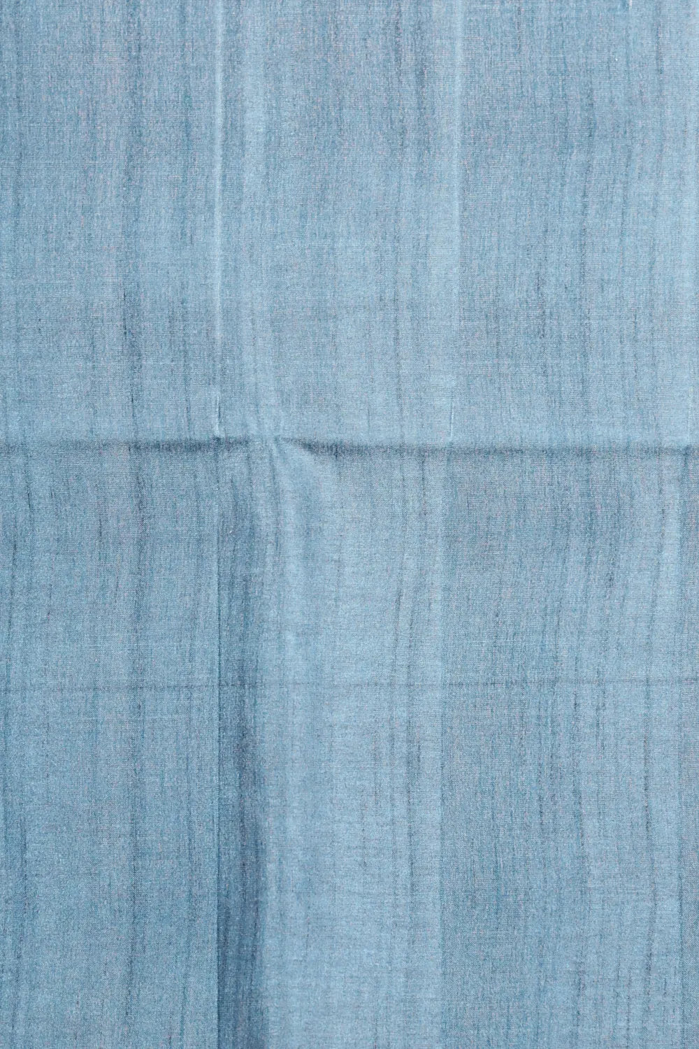 Teal blue semi tussar saree fabric spread, check weave