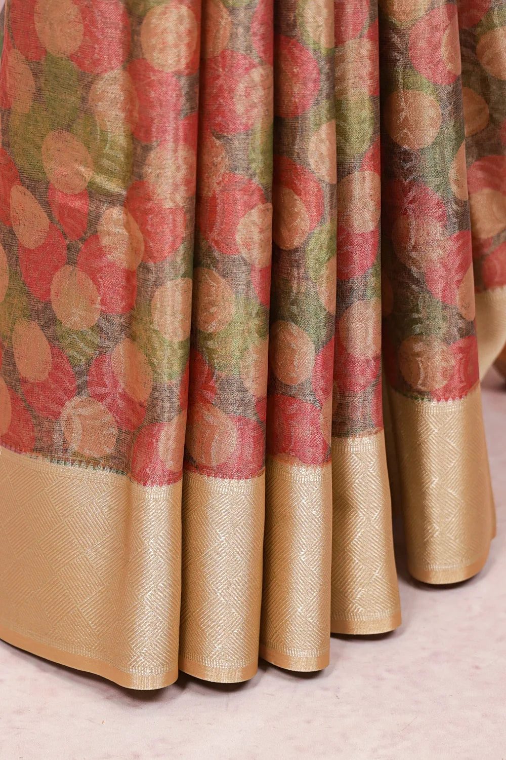 Multi color semi tissue saree fabric spread, overlapping circle print