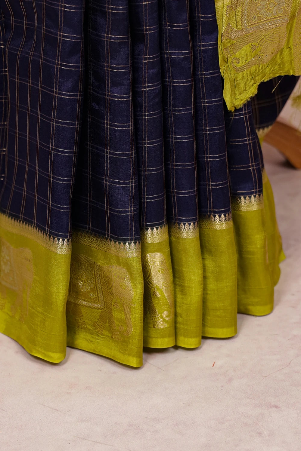 Navy Blue Binni Silk Saree fabric spread, elephant border detail