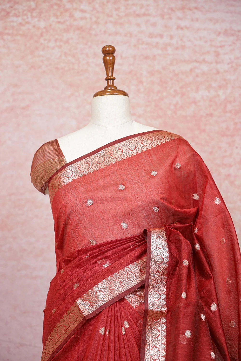 Maroon cotton silk saree pallu close-up with designer border