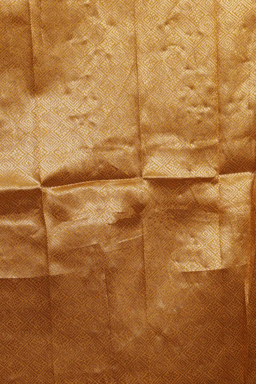 Art silk saree fabric texture, golden zari work detail
