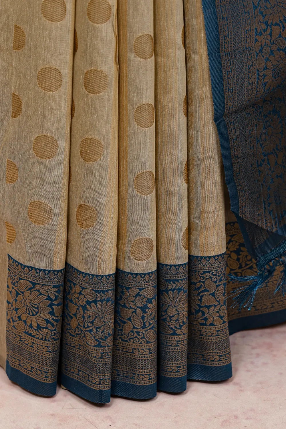 Chikku semi silk saree fabric spread, designer border detail
