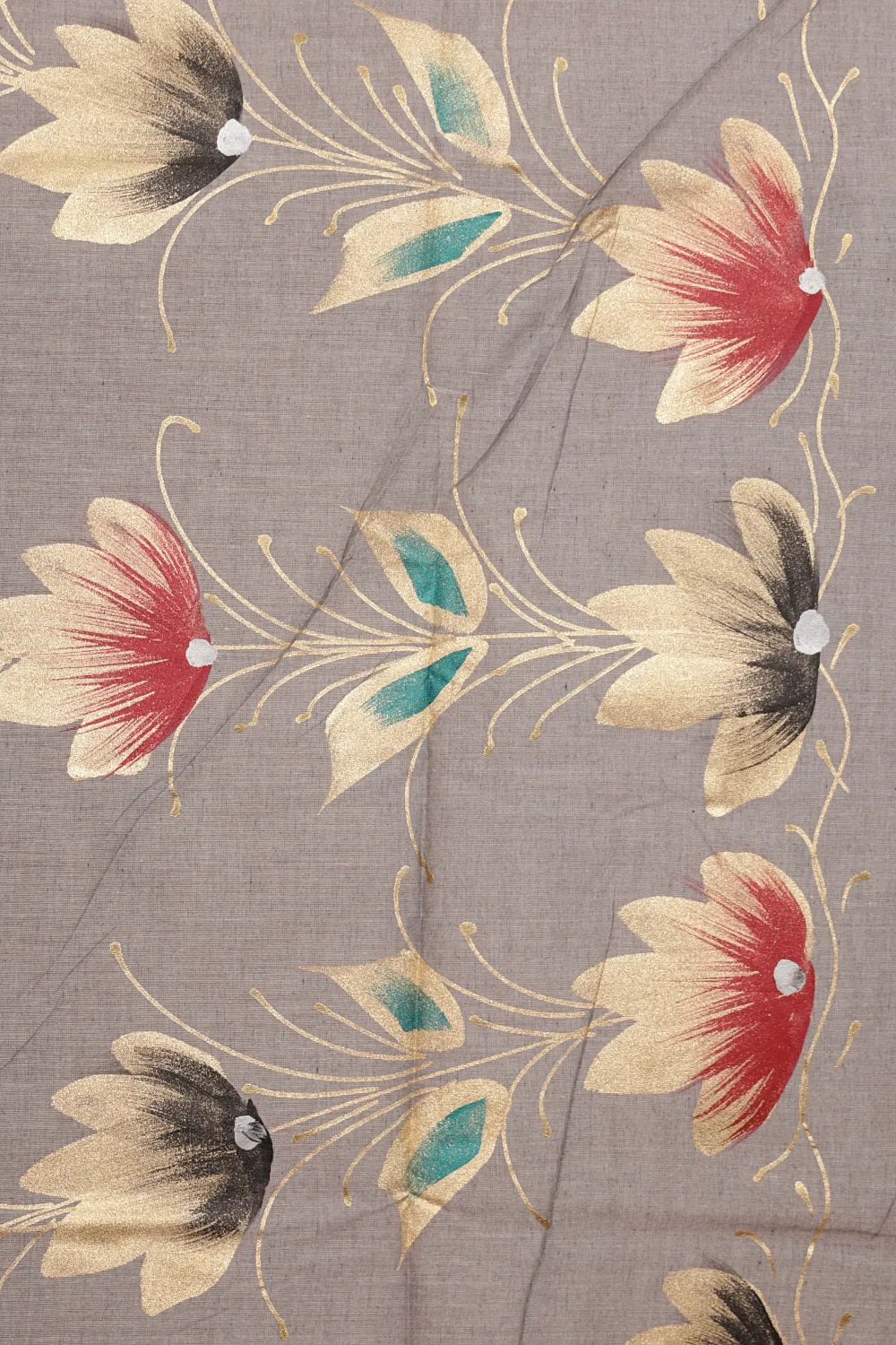 Off white Kerala saree fabric spread, red and teal painted florals