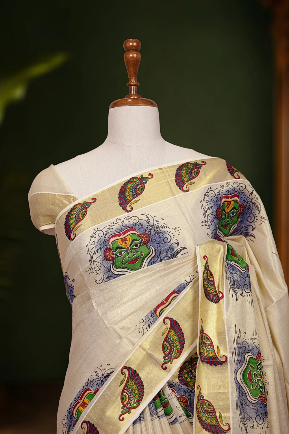 Golden Tissue Kerala Saree pallu close-up with printed border
