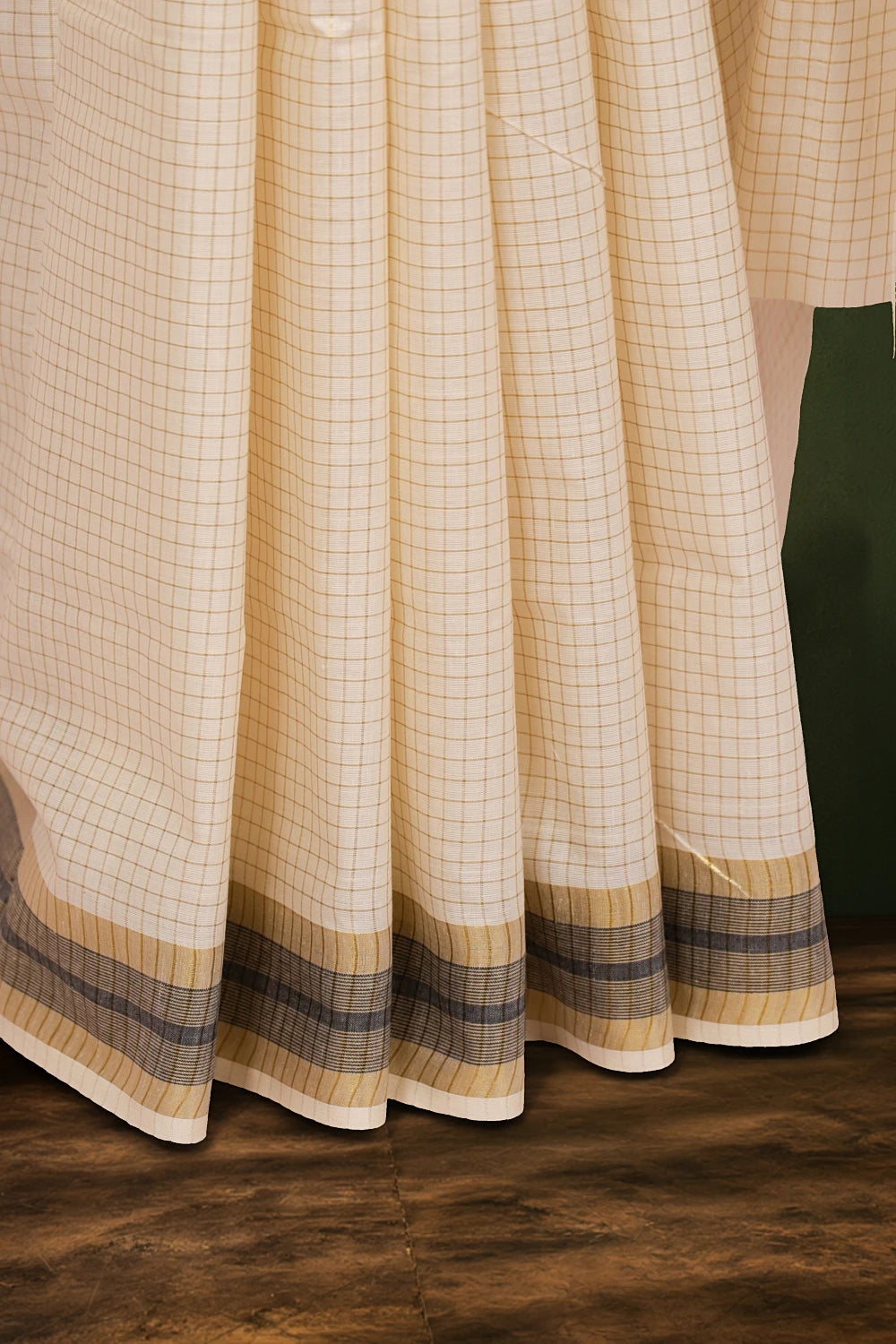 Kerala saree black and gold border, check weave detail