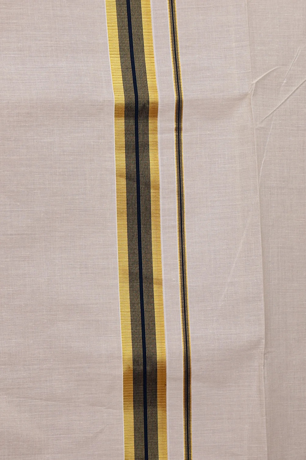 Off White Cotton Kerala Saree fabric spread, gold-black border detail