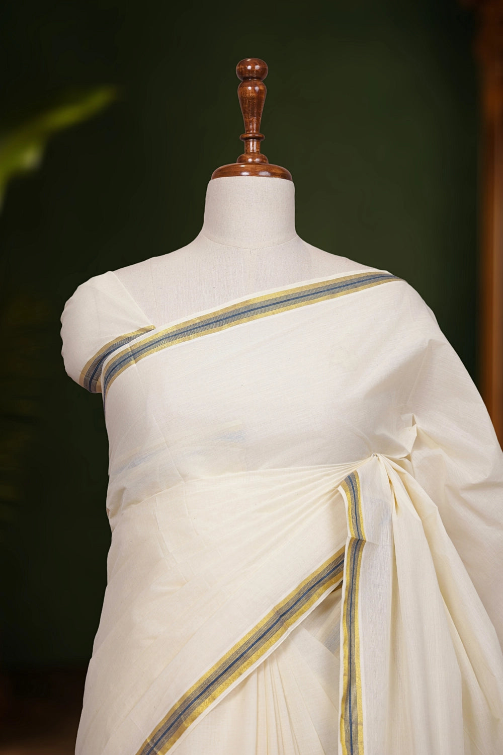 Off White Cotton Kerala Saree pallu close-up with striped border