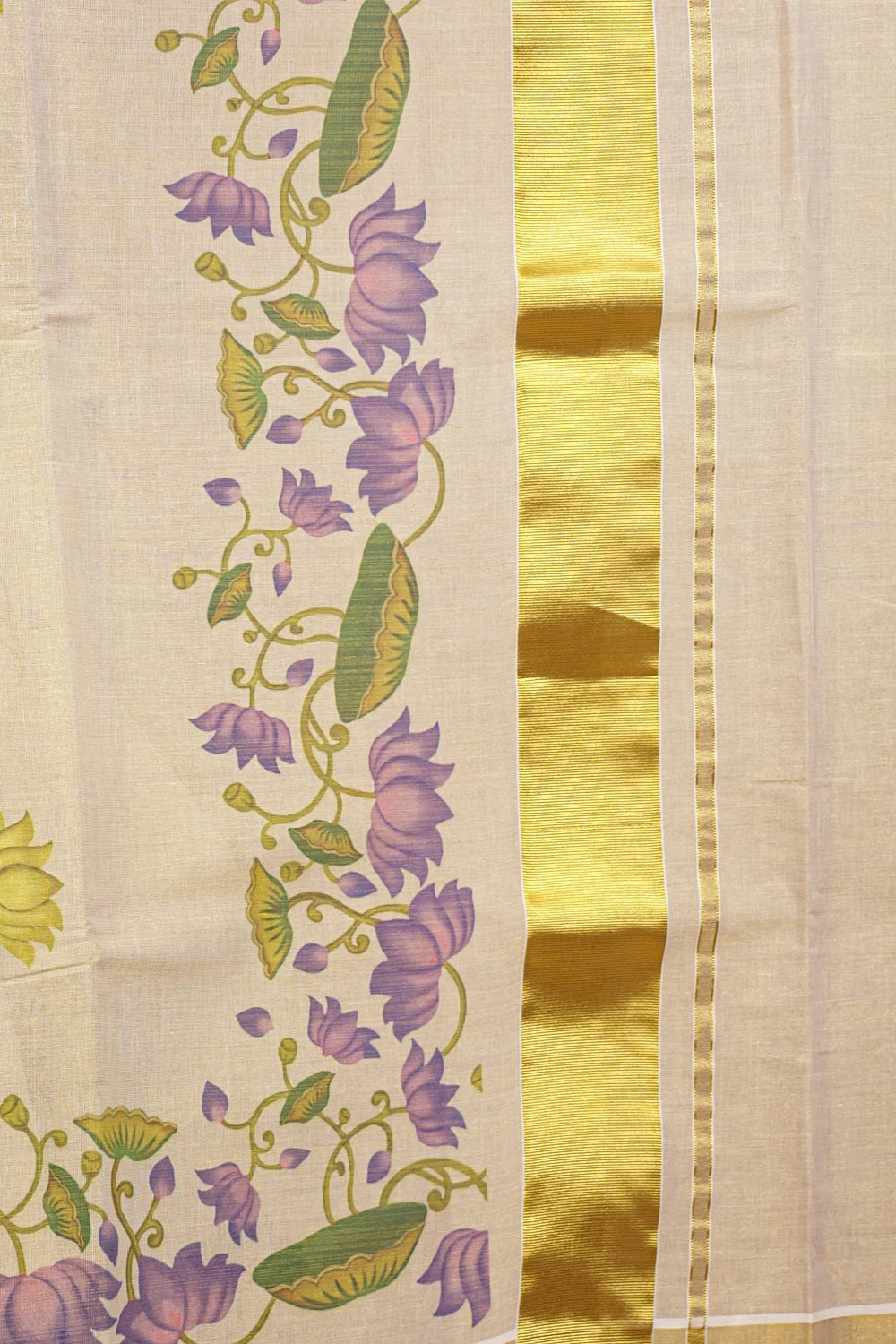 Golden Tissue Kerala Saree pallu spread, lotus vine floral design