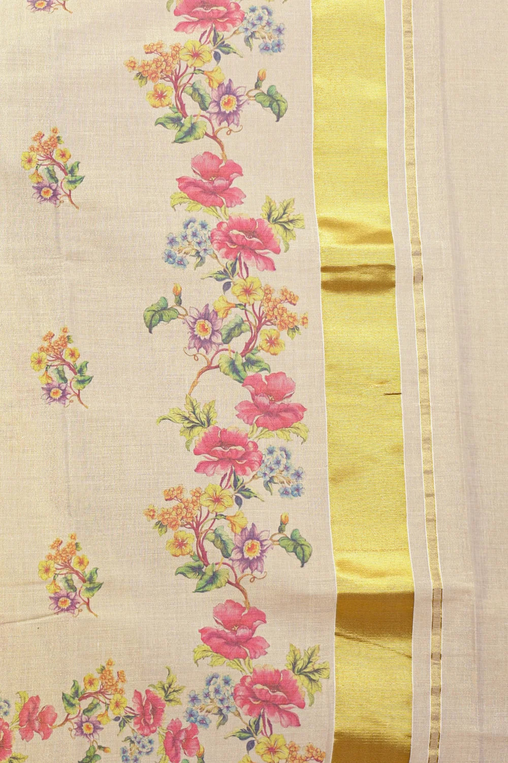 Golden Tissue Kerala Saree fabric spread