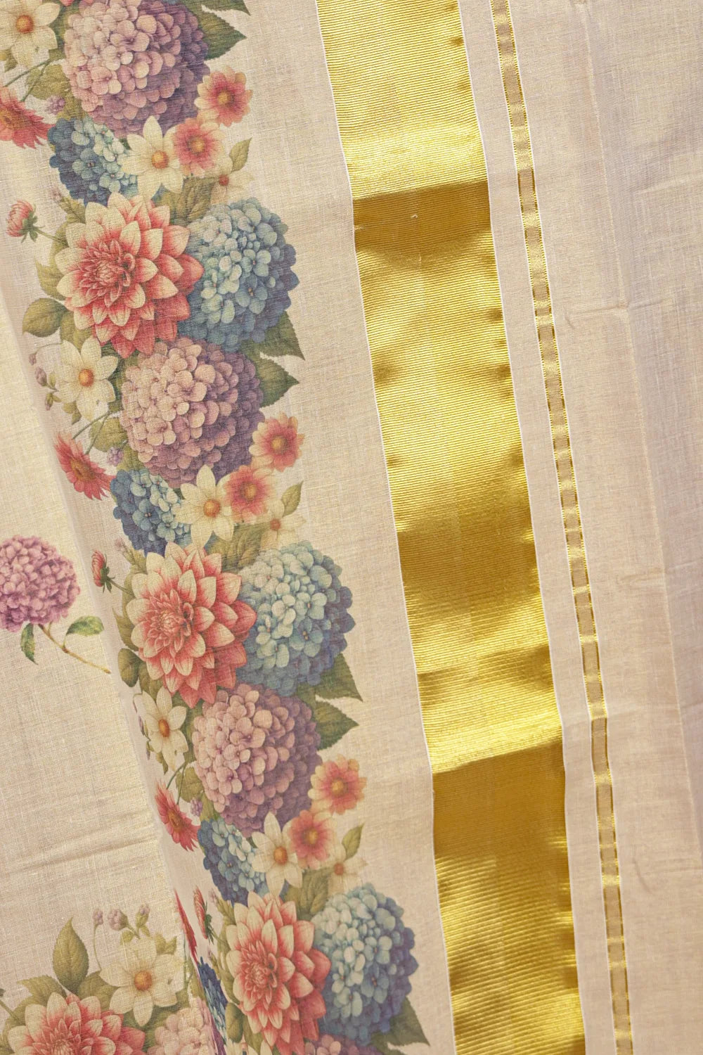 Golden Tissue Kerala Saree pallu spread, vivid floral bouquet design