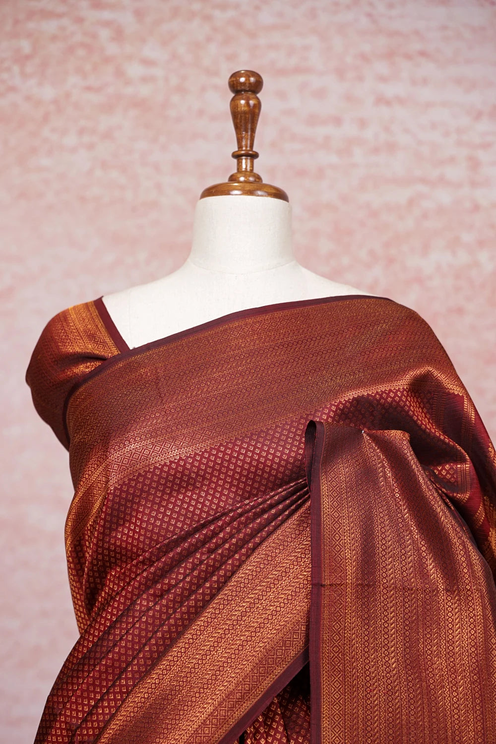 Maroon Kancheepuram Silk Saree draped shoulder close-up with brocade pattern