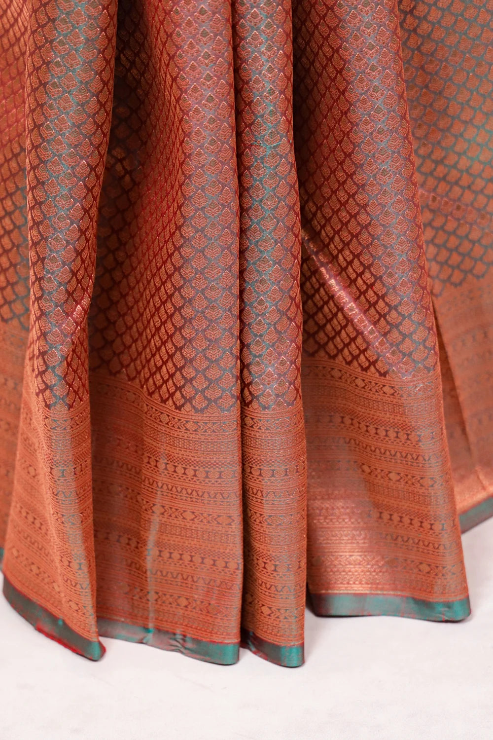 Maroonish Green Kancheepuram Semi Silk Saree