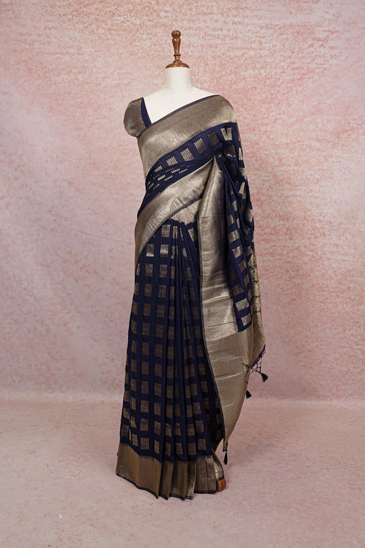 Navy Blue Semi Banarasi Saree with gold designer border, draped on mannequin - Seematti