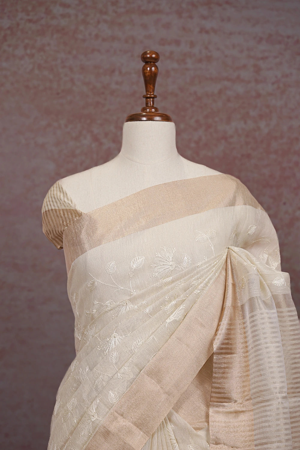 Close-up of off white kota saree pallu showing thread work and copper border - Seematti