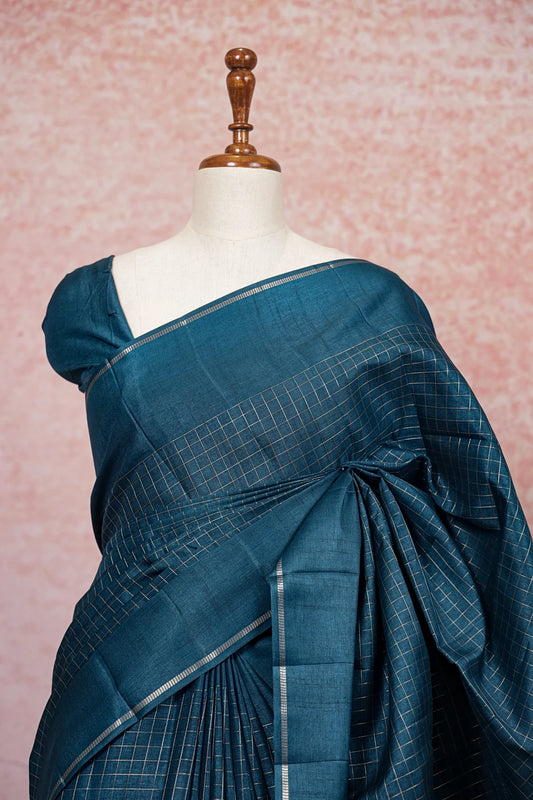 Teal semi tussar saree pallu close-up with check weave