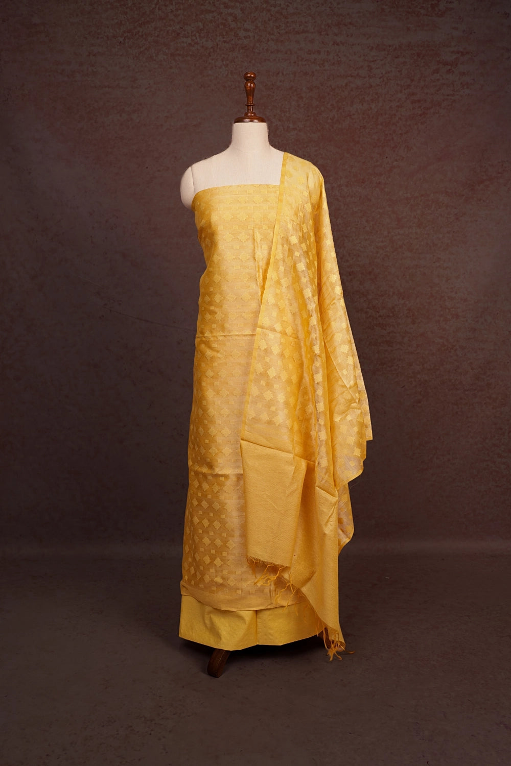 Yellow Semi Tussar Self Design Unstitched Churidhar Material