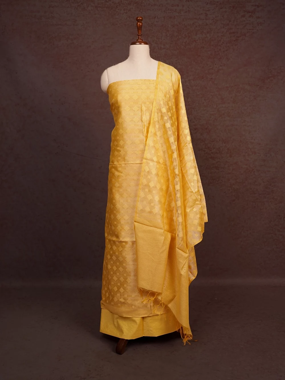 Yellow Semi Tussar Self Design Unstitched Churidhar Material